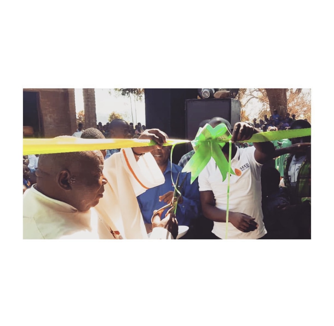 SeedMalawi's tweet photo. BIG celebrations in Thyolo at the grand opening of our seventh school build! 🎉🎉🧡🧡 https://t.co/6kf9nyEnmi