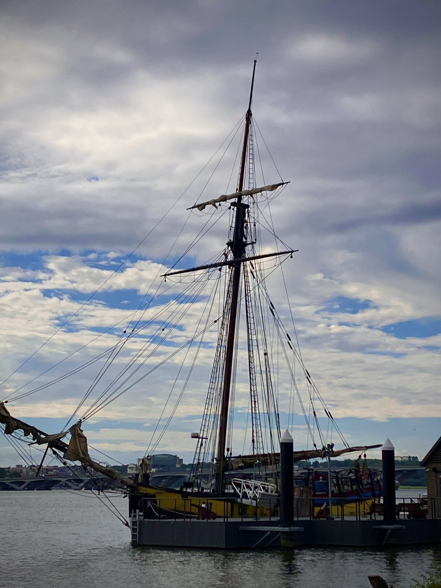 HobanGirl's tweet photo. Stepped out at 8:20am, sun already high, cast blinding dapples over the Potomac. Paths were sodden but not nearly as littered with flood remnants as typical. Dramatic skies punctuated with streaks of blue. Humidity still MIA. #OldTown #Alexandria #ProvidenceTallShip #WilsonBridge https://t.co/VRtiwPFrnW