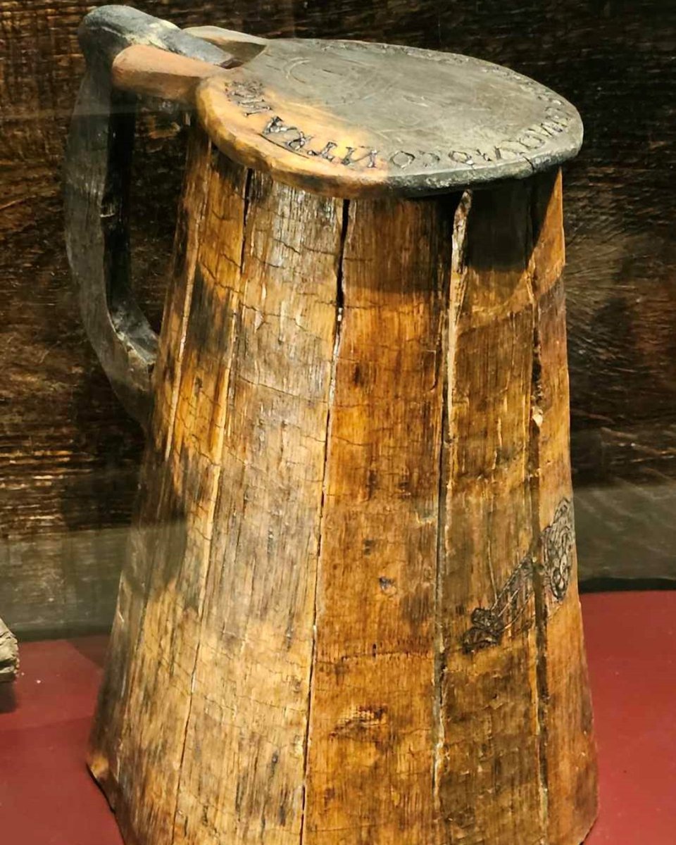 MaryRoseMuseum's tweet photo. "#MyFavouriteArtefact is this gallon #flagon found aboard the Mary Rose. The image of the bronze gun on the side - likely etched by a gunner in their free time - wouldโve been a familiar sight for all who shared the daily allowance of #beer..." https://t.co/GlCrdZXERJ
