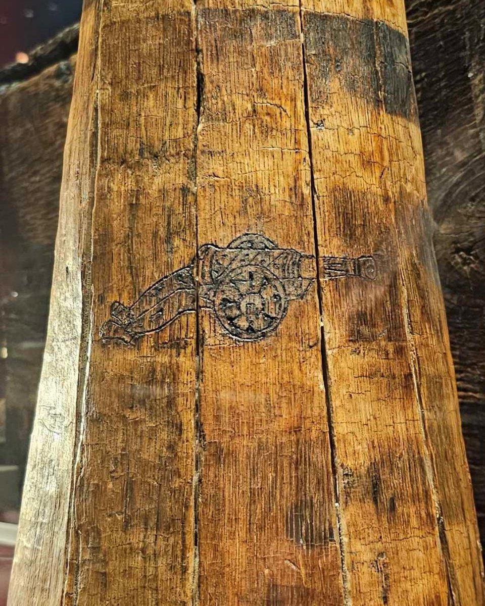 MaryRoseMuseum's tweet photo. "#MyFavouriteArtefact is this gallon #flagon found aboard the Mary Rose. The image of the bronze gun on the side - likely etched by a gunner in their free time - wouldโve been a familiar sight for all who shared the daily allowance of #beer..." https://t.co/GlCrdZXERJ
