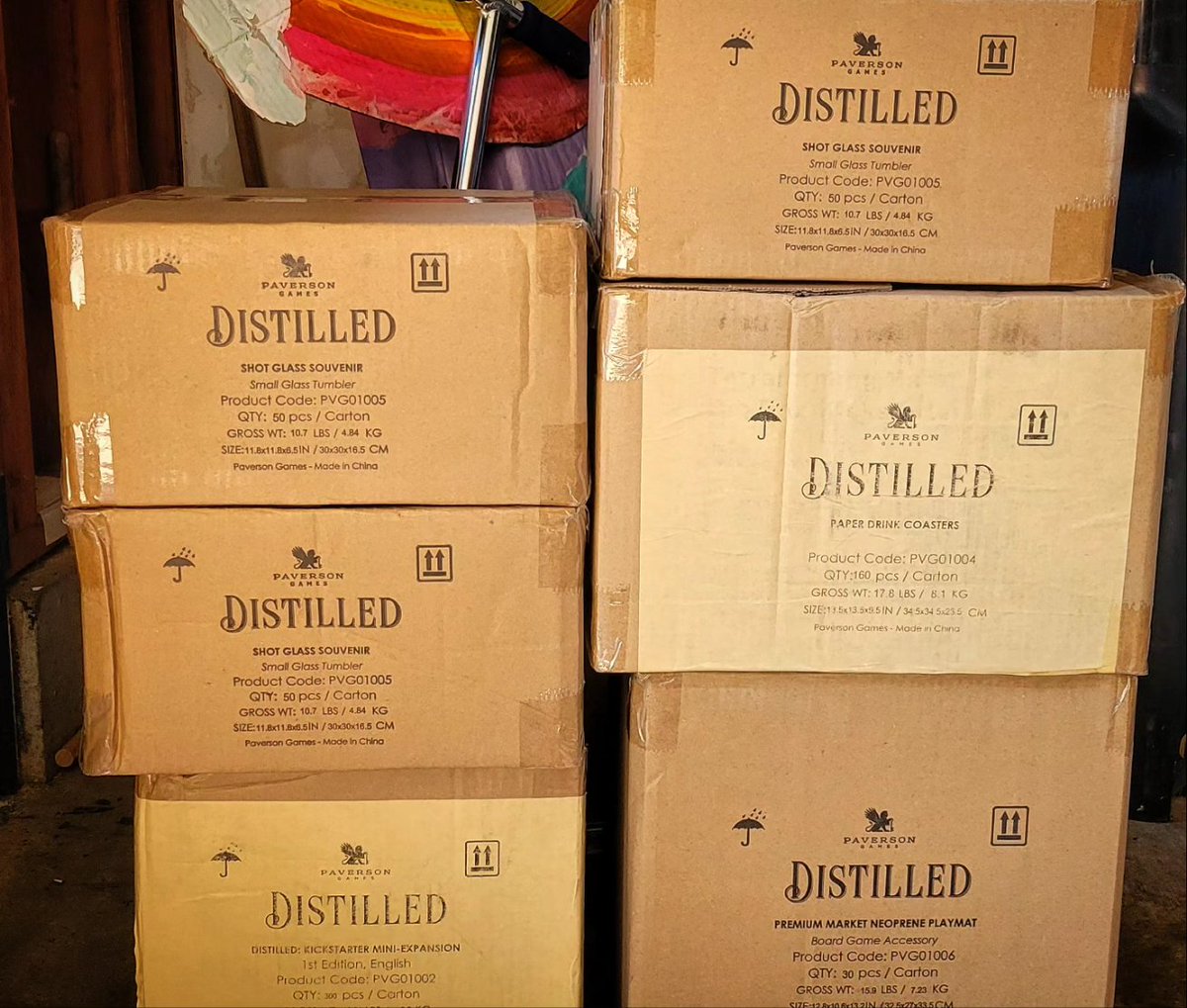 Back after an amazing #GenCon. This may be the last time I'll be able to fit the entire #PaversonGames booth under my stairs for storage. Boxes pic is all we had left to bring home after starting with 4 pallets at #GenCon23! #distilled #distilledgame #luthier #luthiergame