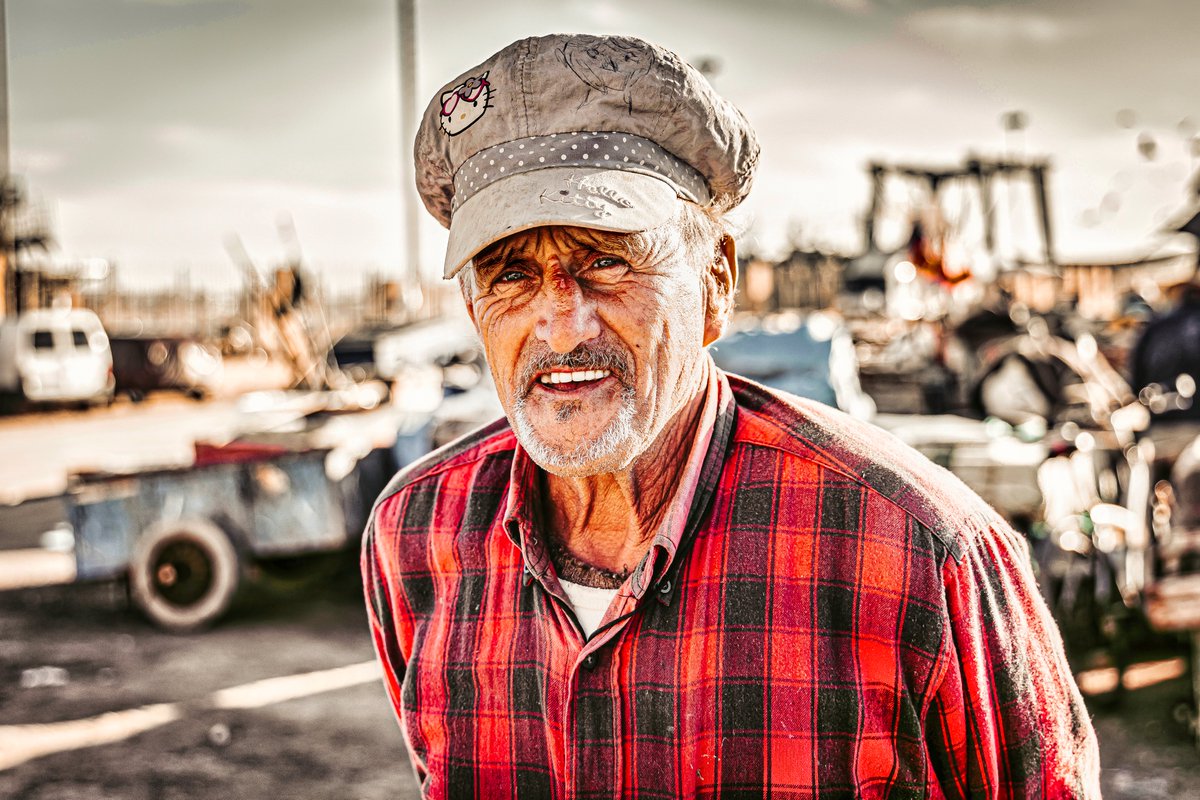 asmithjpeg's tweet photo. Travel Archive.
"Hello Kitty Fisherman pt. I"
Agadir, Morocco.

Was going through some old photos and stumbled upon this portrait of a fisherman I took in Morocco. Just now noticing the stylish Hello Kitty hat and the depth of this old man's eyes. Makes for such strong contrast. https://t.co/0MMtIaFBja