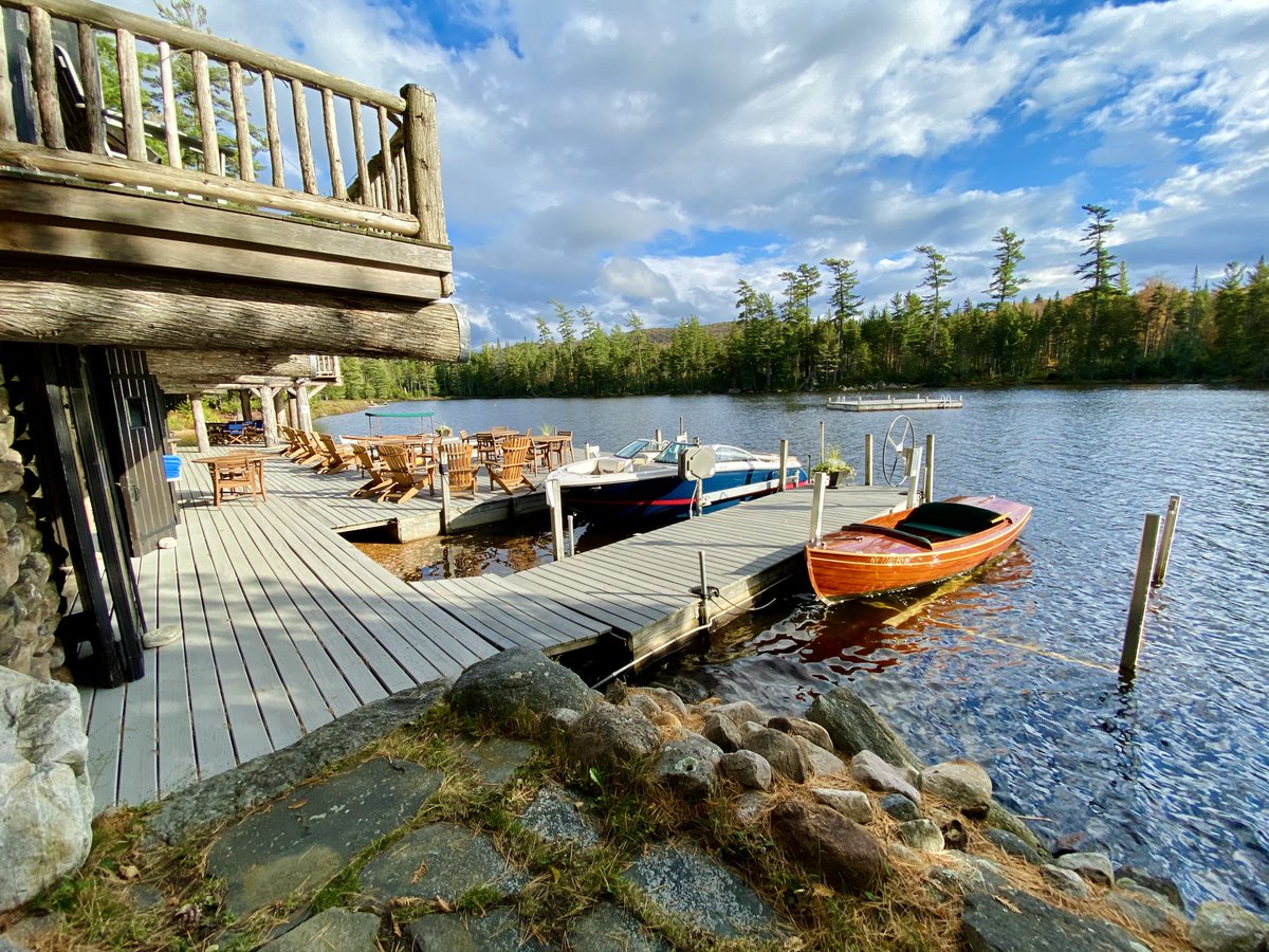 It's the height of summer &amp; your private #lake is calling-swimming, boating, tubing, paddle boarding, canoeing, kayaking, or just relaxing in the many Adirondack chairs at the water’s edge. #LuxuryTravel #adirondacks #upstateny #jetset #iloveny #familytravel #travel #adks #summer
