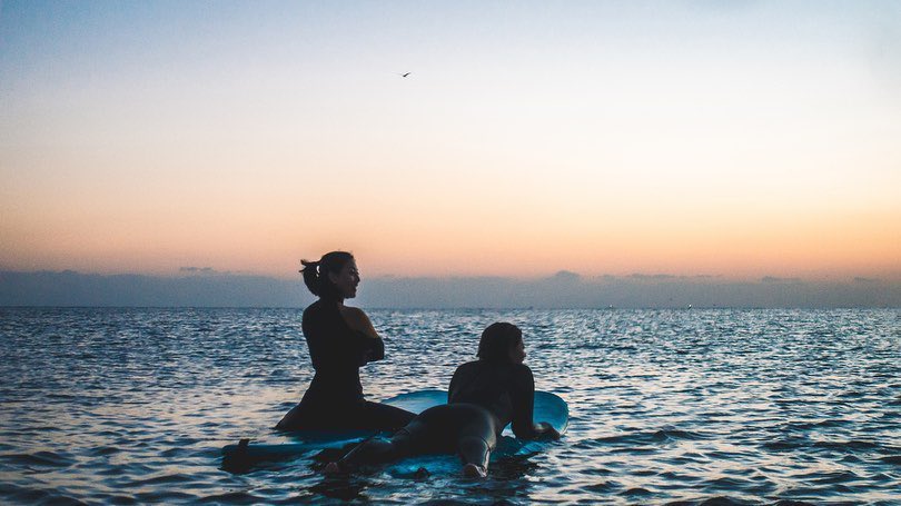 One of Jihyo's Message Photocard is from her surfing trip with Jeongyeon previously! She wrote "... a moment I miss now!"