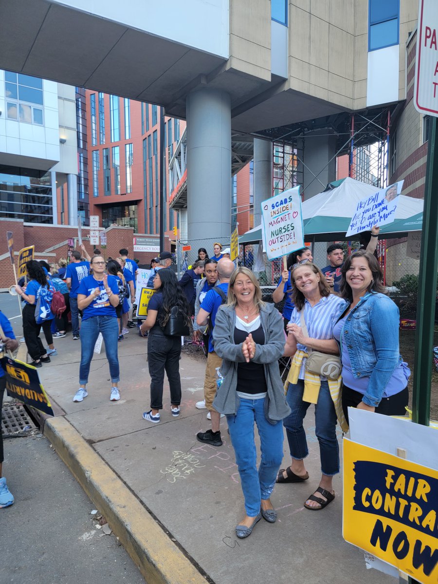 NJEA's tweet photo. More than 1700 nurses employed at Robert Wood Johnson University Hospital are still on strike, after walking off of the job on Friday, August 4. While many of our members were in the area for the Summer Leadership Conference, they joined the picket line in solidarity. #WEareNJEA https://t.co/8Z95uxcMJH