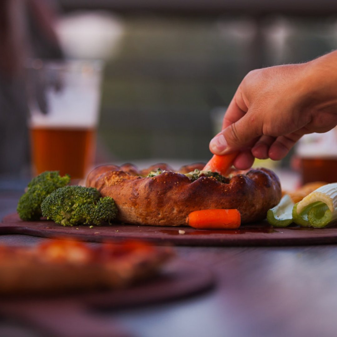 The Hearty Arty. 🍃🙌 Spinach and artichoke dip served in our Colorado-style crust. Are you dipping with the veggies, chips, or crust first? 🤔