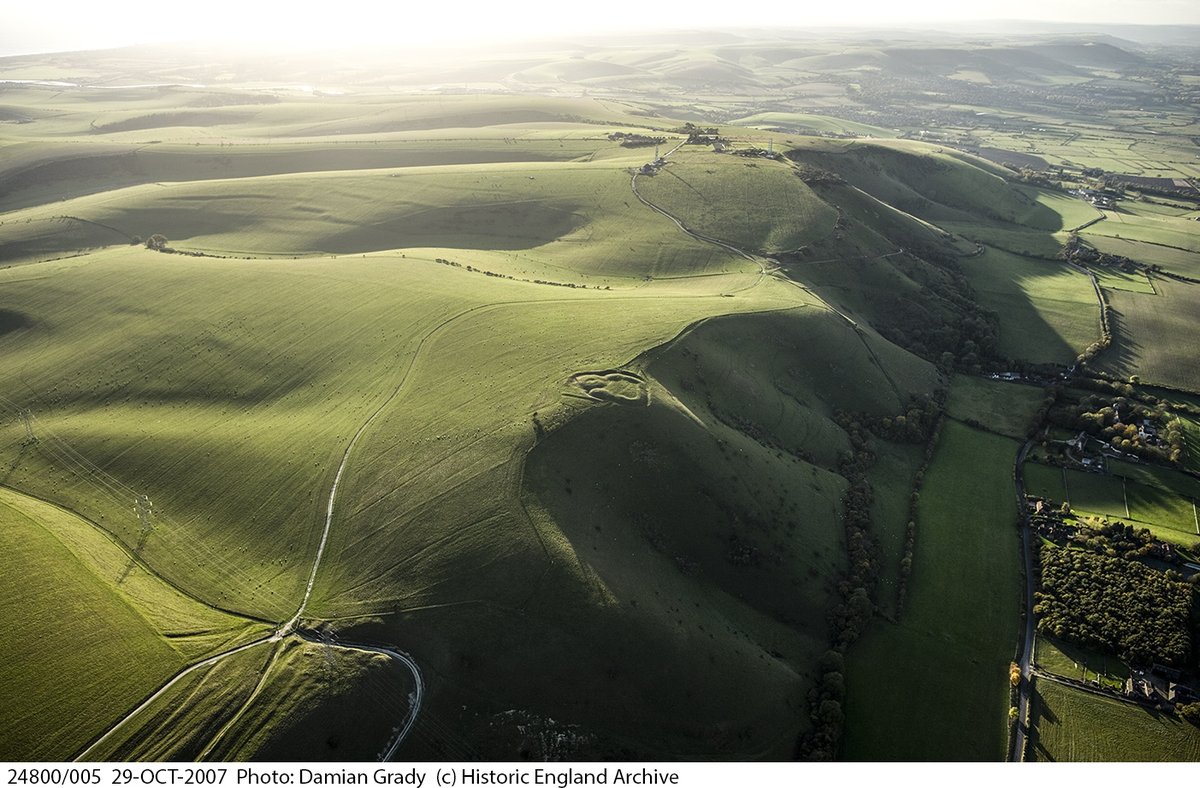 Interested in the archaeology of the South Downs?

We've examined over 9,500 aerial photographs, ranging in date from the 1920s to the present, plus lidar imagery, to map hundreds of sites across a block of the South Downs National Park. Scroll down for more info... (1/5)