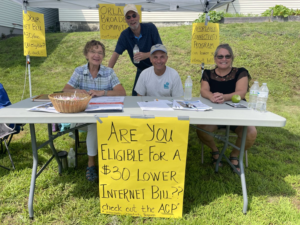MEConnectivity's tweet photo. Another great picture from the ACP Week of Action - Marybeth Allen, David Perez, Laurie Kelley, and Marc Restuccia of the Orland Broadband Committee at the Bucksport Bay Festival. Thank you to these committee members and @islandinsitute spreading the word about the ACP! #acp4me https://t.co/oVV7ISSqex