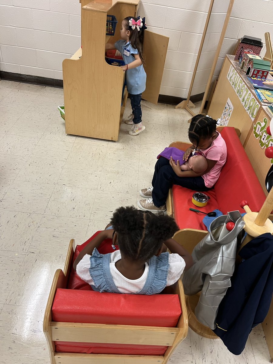 mbullock24's tweet photo. @MsBryant19 @EaglesSouthwest 
Rocking our twins and cooking them food! Day one dramatic play in PreK 4 https://t.co/zKHVBfQyas