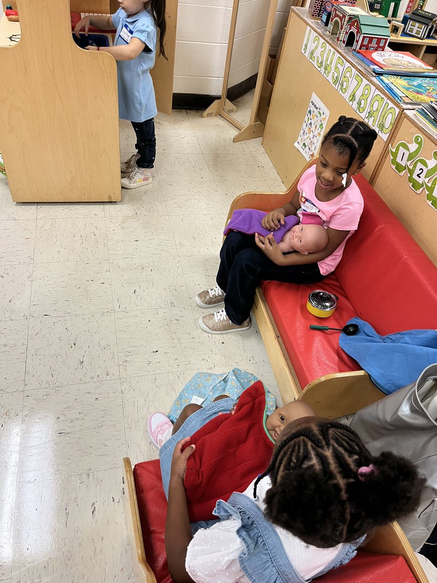 mbullock24's tweet photo. @MsBryant19 @EaglesSouthwest 
Rocking our twins and cooking them food! Day one dramatic play in PreK 4 https://t.co/zKHVBfQyas