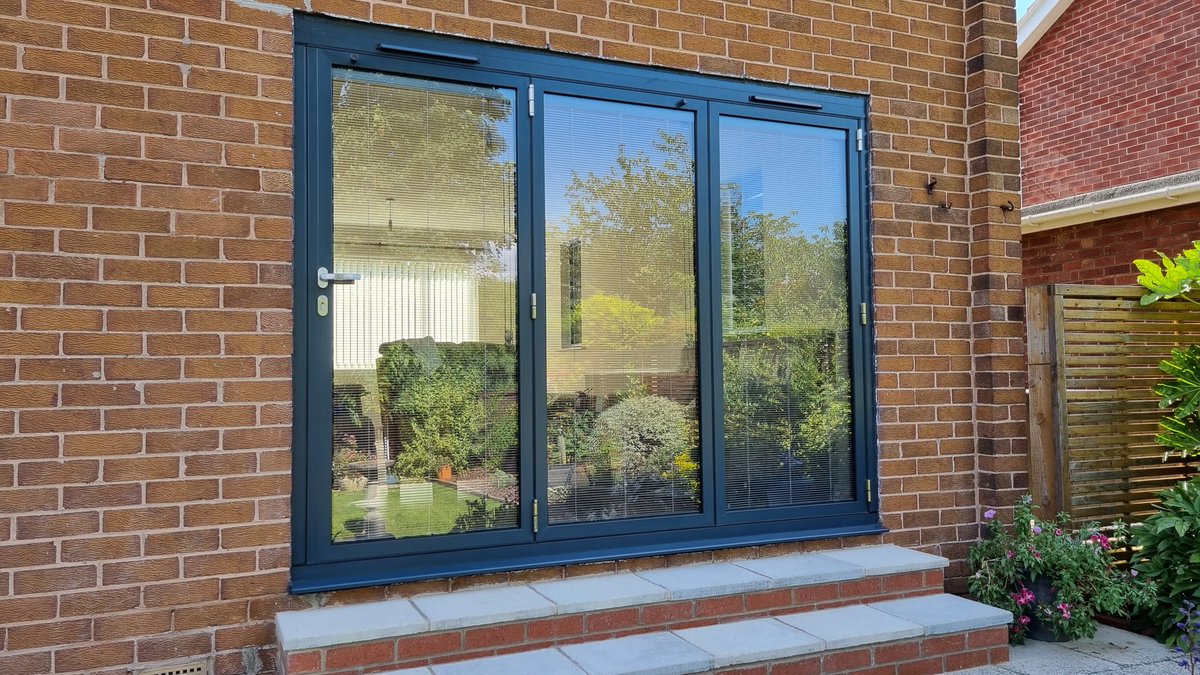glazingblogger's tweet photo. Nice little Anthracite Grey aluminium bi-fold installation we did with @MorleyGlassGlaz in matching colour. We did the steps too. #aluminium #bifold #blinds https://t.co/UXtskrqgnw