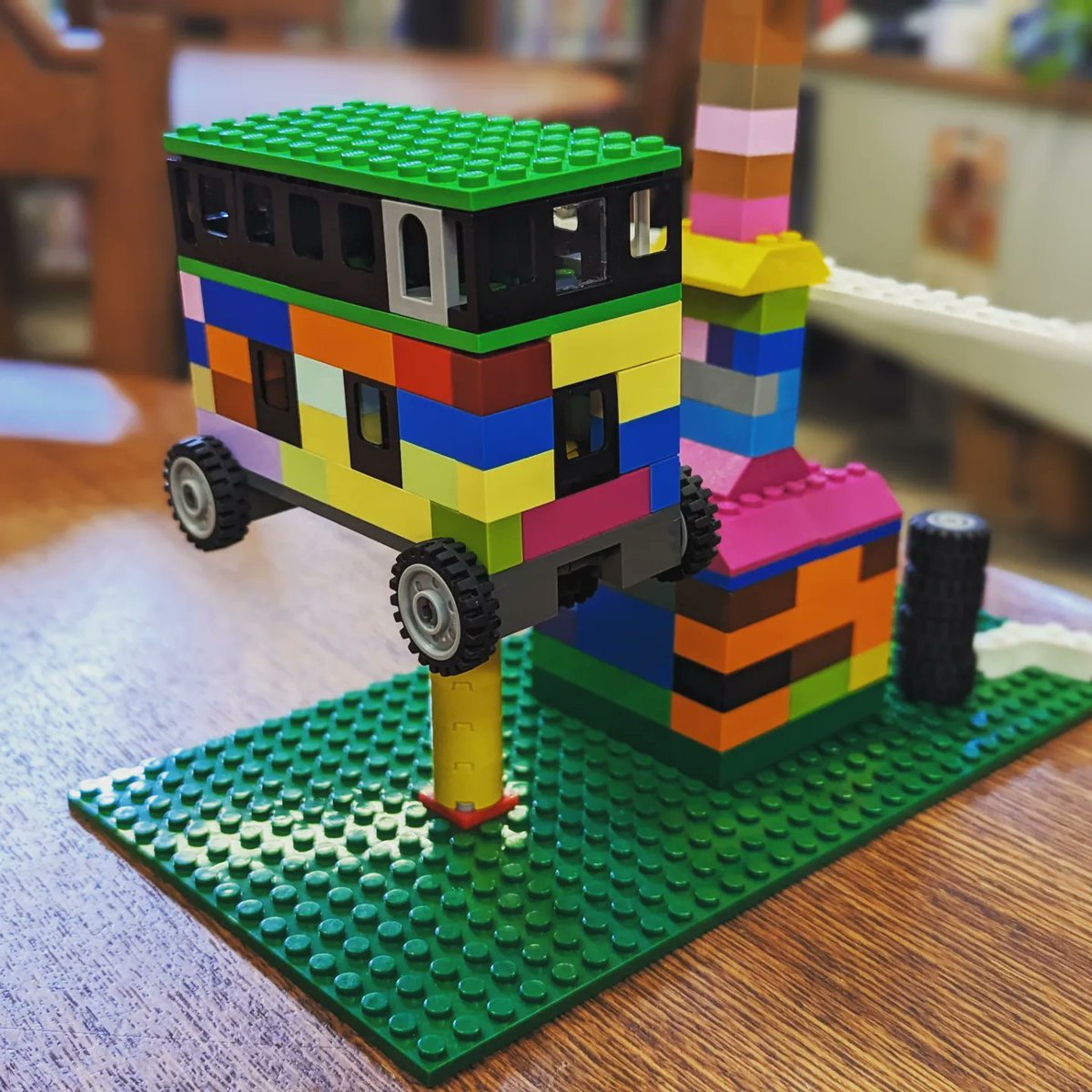 sujeilugo's tweet photo. Me: oh what is this? 
Lego club kid: this is a mechanic. my dad's car had a flat tire. This is the fence and the car they are fixing. 
#legoclub #legobuilders #legos #librarykids https://t.co/ThDEg9zc5i