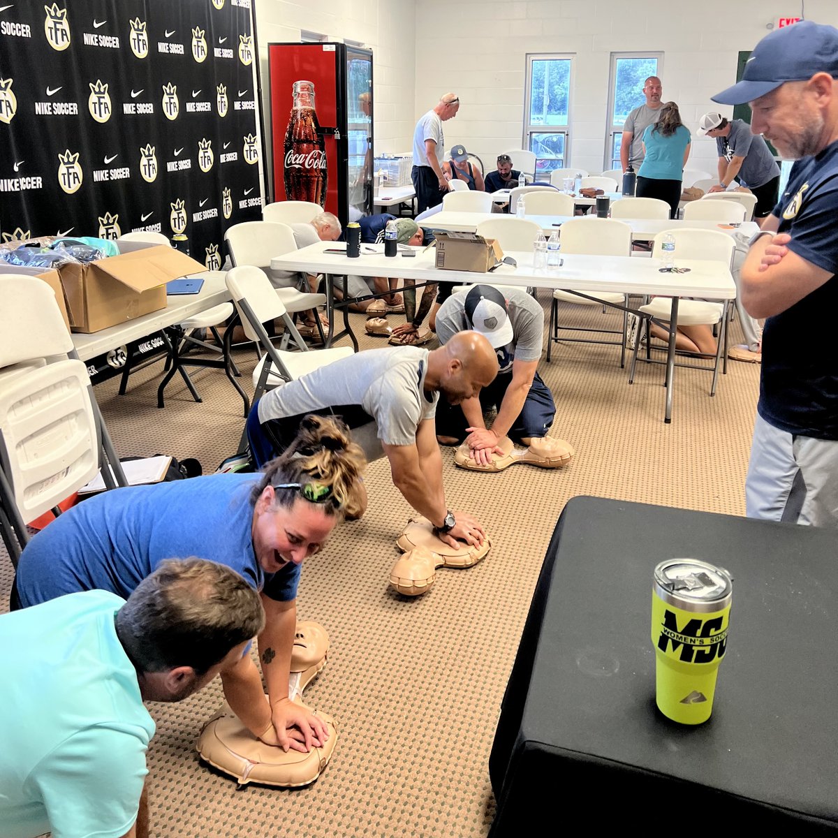 TFA_Cincinnati's tweet photo. On Sunday night, Novacare ATCs Lauren White (@THSATC), and Linda Clarke (#TFAG15Gold, @colerainat) provided the Take 10 Cincinnati Training for over 30 TFA coaches to equip them with life-saving skills. We are very grateful to have this equipment as we open up our fall season. https://t.co/sAo1URqRBp
