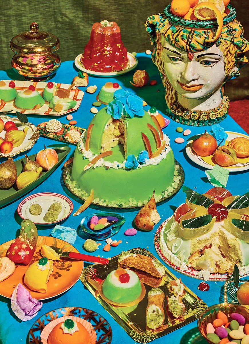 Triumph of Gluttony, a puzzle from Victoria Granof with Piecework is a feast for your eyes and senses. Granof teamed with Henry Hargreaves to capture the image with a styling assist from Ester Masciocchi, bringing Sicily to your home with an array of authentic Sicilian dolci.