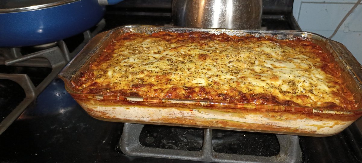 shriekingghost's tweet photo. I made zucchini lasagna --with thinly sliced zucchini as noodles, ricotta, parm and parsley in the middle, Boca crumbles in the sauce, and topped with mozzarella and parmesan. https://t.co/mGzsPCYCqL