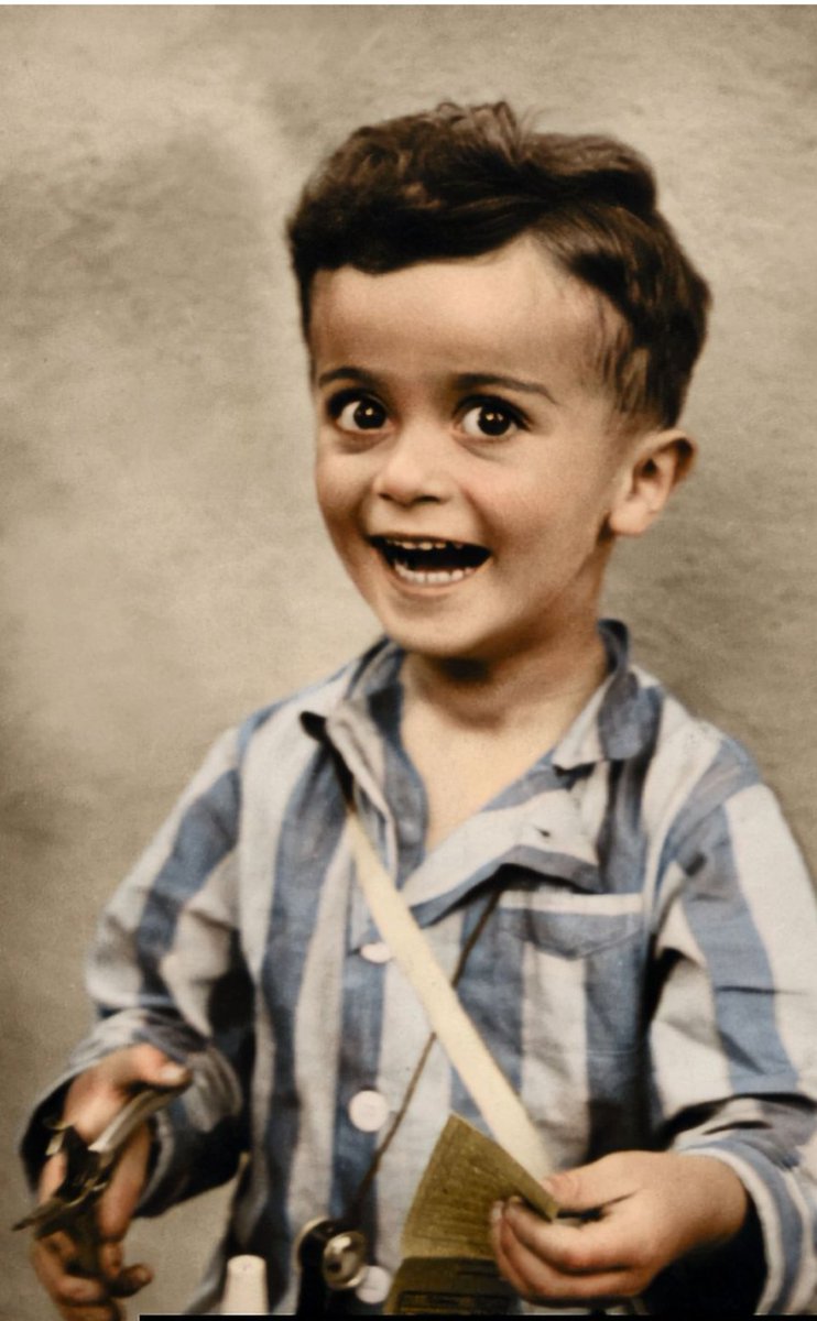4-year-old Istvan Reiner smiles for a portrait shortly before being murdered in the Auschwitz concentration camp.