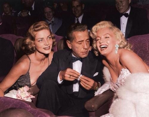 Humphrey Bogart, Lauren Bacall And Marilyn Monroe at the premiere of the film How to Marry a Millionaire. 1953