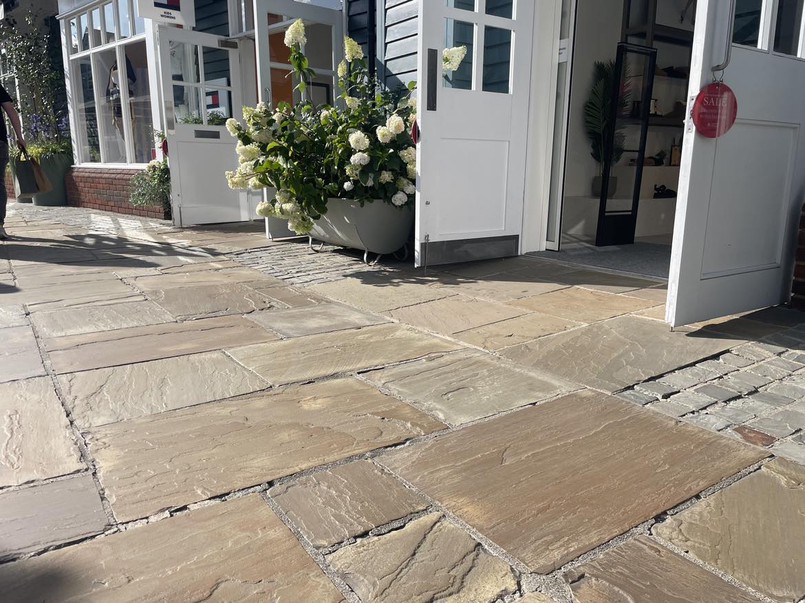 Recently, in a rare moment of weekend sunshine, we were able to visit #Bicester Village and take a look at our #Raj Green #sandstone #paving, installed over a decade ago. Still looking great, with thousands of shoppers passing over every year. 

#stone #mason