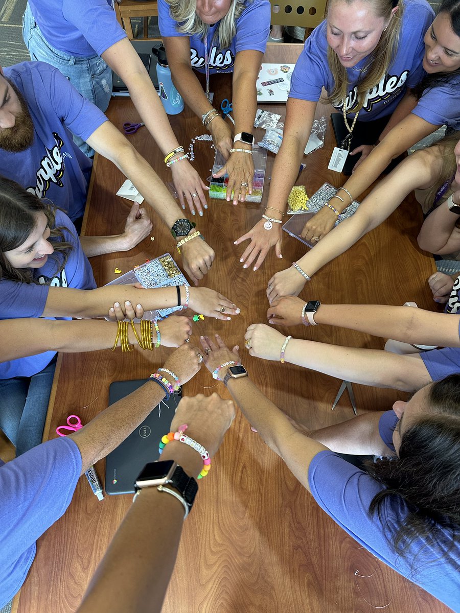 dishmanmcginnis's tweet photo. First staff meeting of the school year, friendship bracelets with your word of the year 📿🩷 And goes along with our FRIENDSHIP in many languages board in the main hallway! 💟 #dishmanfriendshipera https://t.co/uJBJ9nE9Vu
