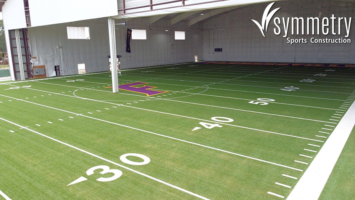 Check out this very cool multi-purpose facility @FarmersvilleAth...half of the field is INSIDE the facility! 🏈 The Farmers selected a premier @AstroTurfUSA #syntheticturf system that includes a @TeamBrockUSA shock pad and cooling #BrockFill! #SymmetryDifference #highschoolsports