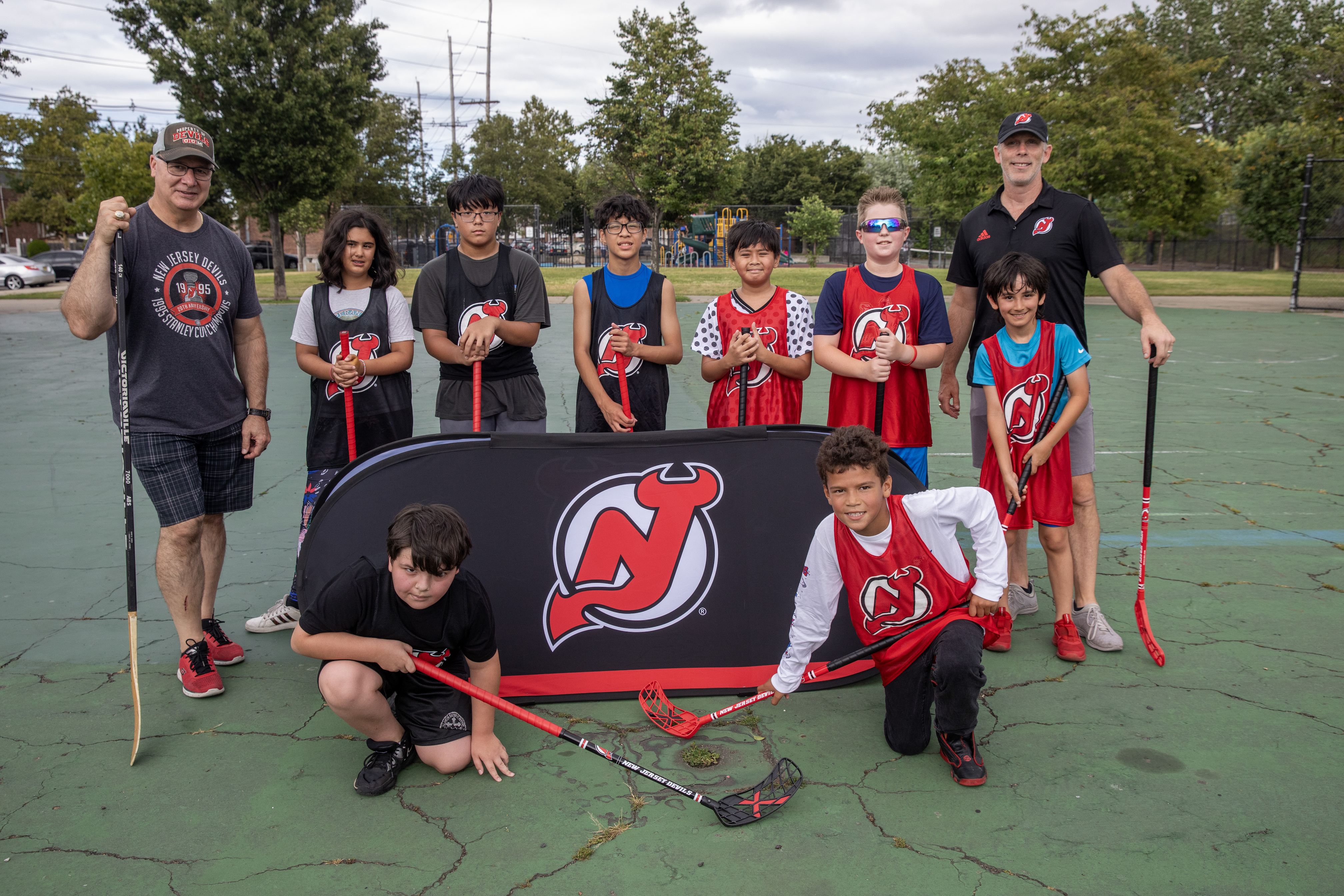 New Jersey Devils Bruce Driver reaches out to fans during a