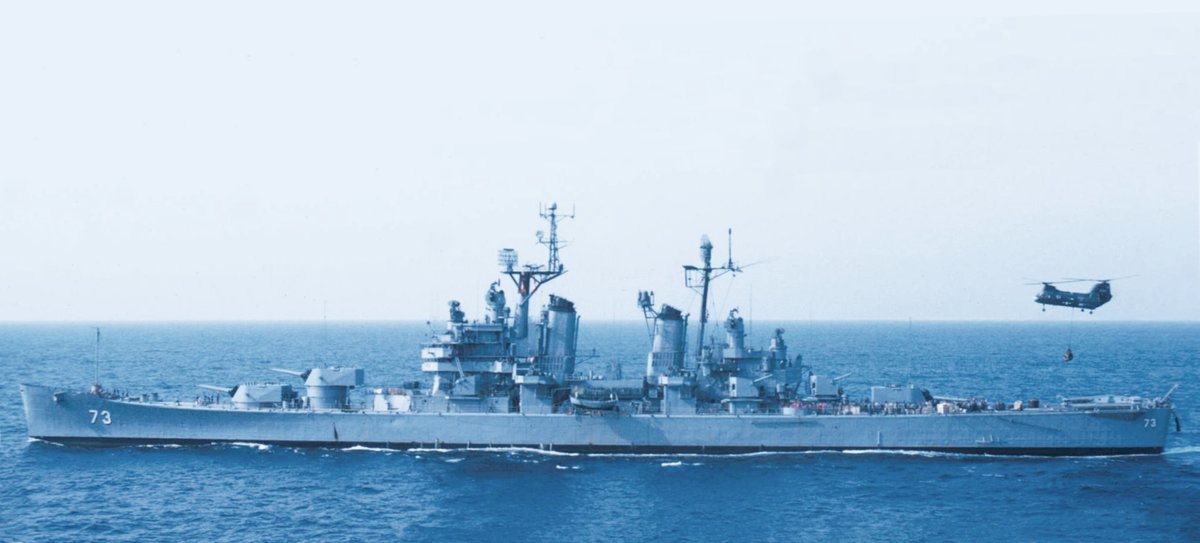 Date: Summer 1969. Location: The South China Sea north of Đà Nẵng, Vietnam. Event: USN heavy cruiser Saint Paul and a Boeing Vertol CH-46 Sea Knight helicopter are performing a vertrep operation. Current status: Scrapped in 1980-81, lifespan of 38 years. Photo taken aboard