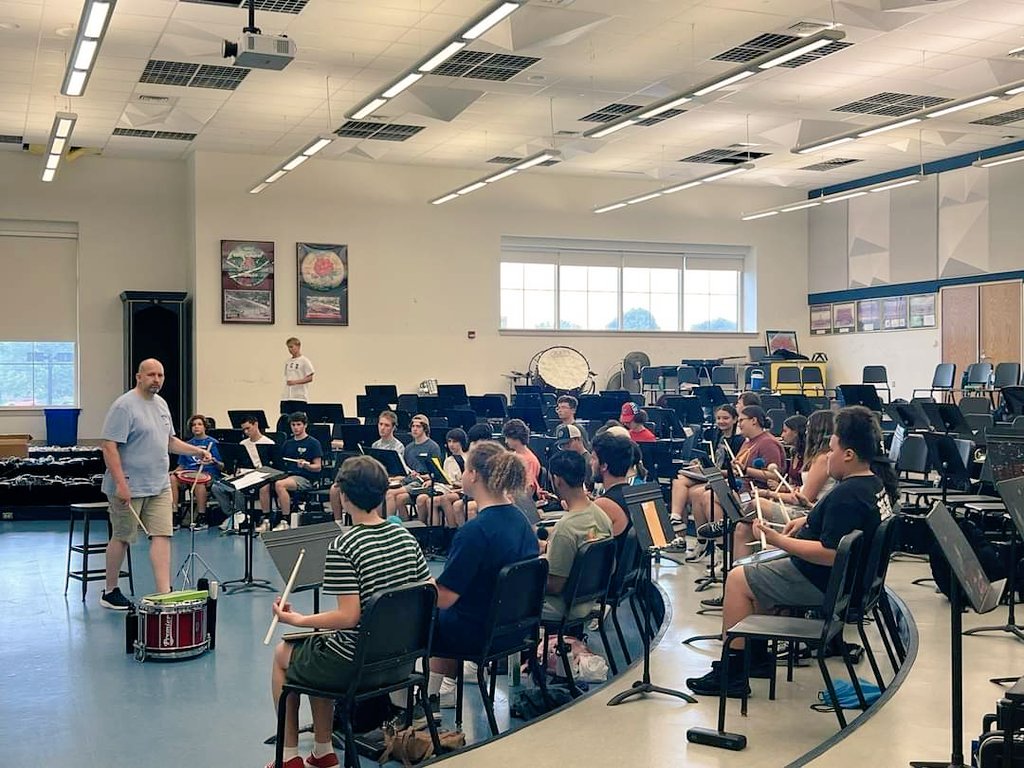 TheWashTattoo's tweet photo. Did you know that our very own Development Advisor Stu Warmington, who is based out of the #UK comes to the U.S. every year to teach students at the #LibertyHighSchoolGrenadierBand during their band camp? It is just one of the many ways you see @TheWashTattoo in the community https://t.co/PdOxen9Gtm