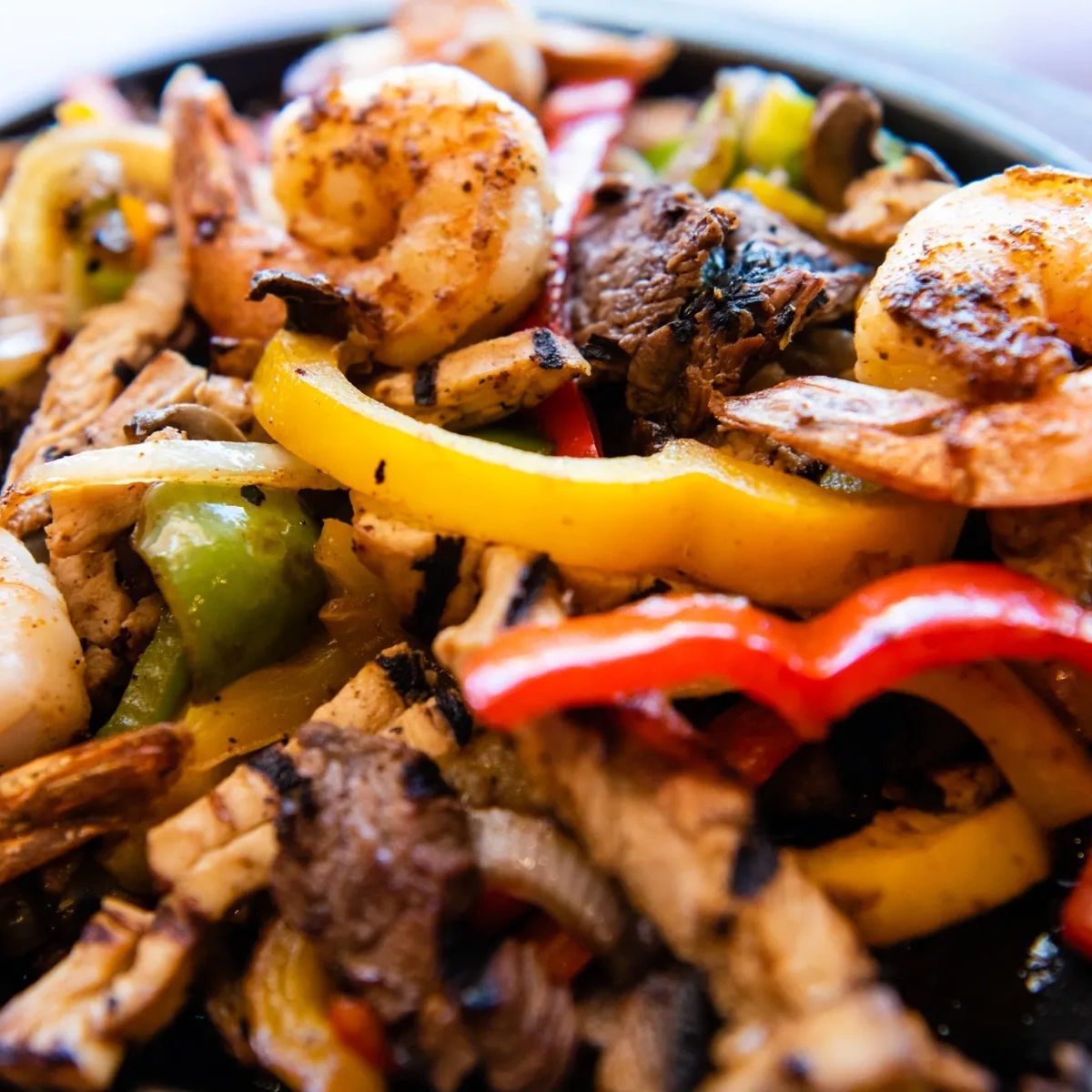 107grill's tweet photo. Craving something other than tacos? We've got you covered with our sizzling fajitas! Come in for a bite. #GrillOnTexMex #TexMex #ATXEats #ATXFoodie #AustinTexMex https://t.co/f8bv86XNXJ
