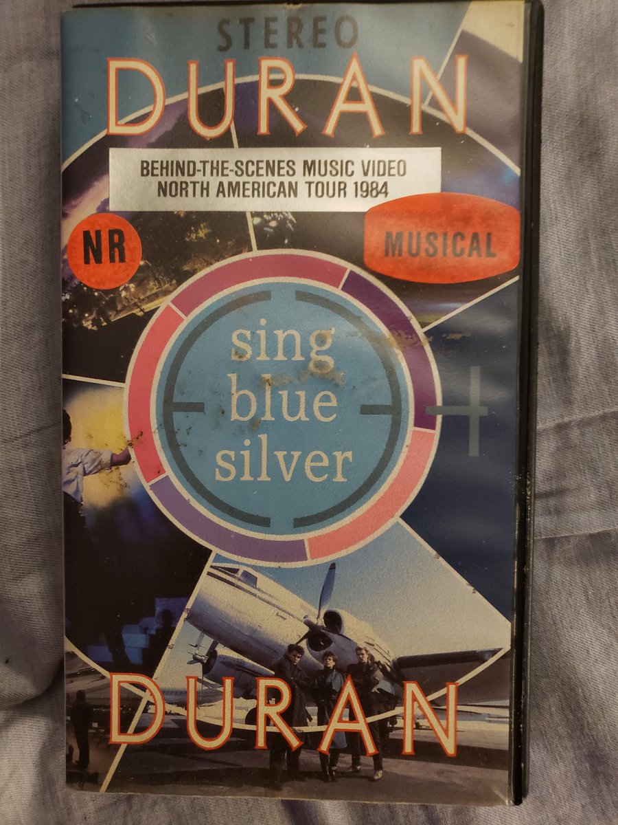 durandurantulsa's tweet photo. Now showing on my @duranduran Appreciation Day Filmfest...Duran Duran: Sing Blue Silver (1984) on glorious vintage VHS πΌ! #DuranDuranAppreciationDay #DDAD #ddad2023 #duranduran #singbluesilver #duranduranlive #simonlebon #nickrhodes #rogertaylor #johntaylor #andytaylor #80s #vhs https://t.co/rX4pSex5hk