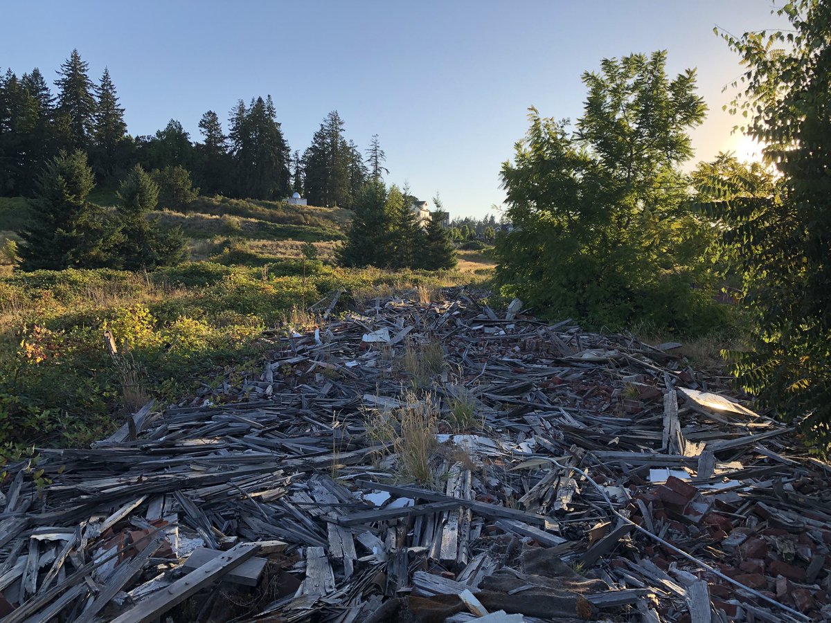 ExploresRetail's tweet image. The remnants of what’s left behind at the former Fairview Training Center. Majority of buildings were demolished several years ago except one is still standing to this day. It is the green building near the water tower.
