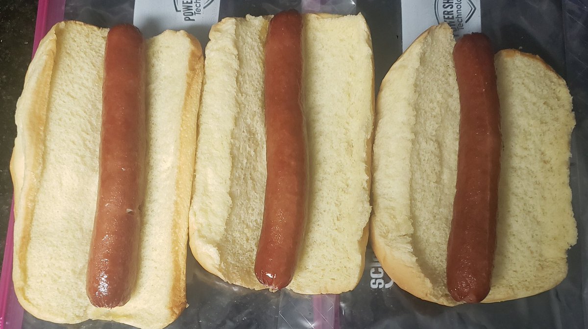 Air fried beef angus hot dogs waiting for each ones toppings. Too hot to grill outside, add toppings, drop parchment paper in air fryer and each made to order.. put back in air fryer to cook a few minutes and works better than I thought. #recipe