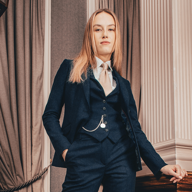 Silk knit ties and pocket chains; refined accents to elevate a suit. #walkerslater #contemporarycollection #womenssuits #womenssfashion #britishtailoring