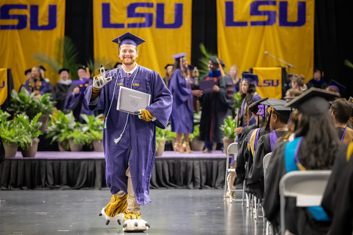 It’s a tradition that all members of Team Mike wear Mike paws at their graduation ceremonies. Congrats to #LSUGrad Matthew Wallace! 🐯🎓💜💛