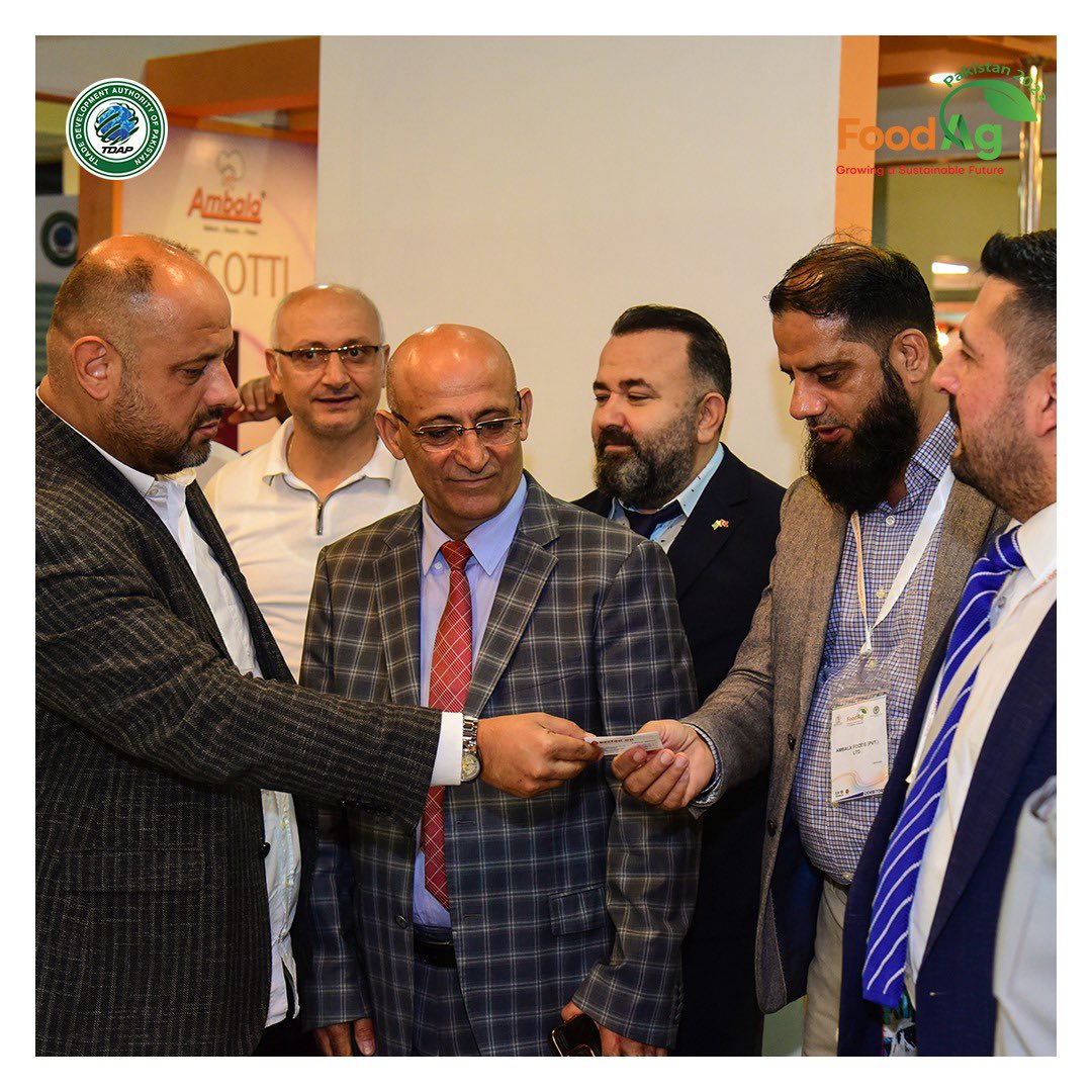 official_tdap's tweet photo. Here is a glimpse of foreign delegates tasting Pakistani produce and conversing with local company representatives. FoodAg 2023 saw local companies displaying their wide range of products and attracting delegates to their respective stalls to discuss partnerships and trade deals. 

@mincompk @GovtofPakistan 

#FoodAg2023 #TDAP #GrowingASustainableFuture