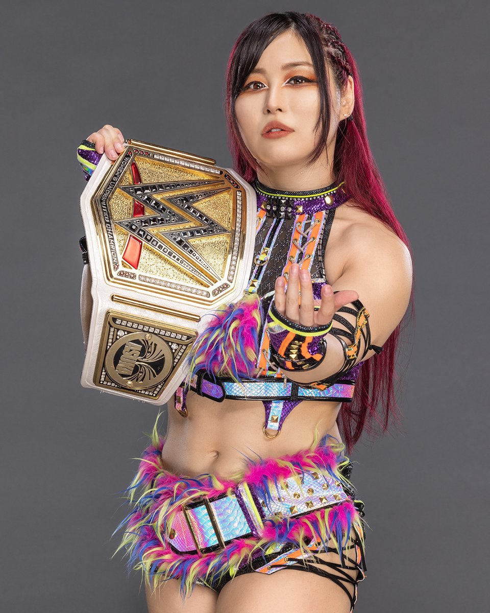 WWE's tweet photo. The new champ's first photo shoot 📸🔥

@Iyo_SkyWWE https://t.co/xqjuYk106P