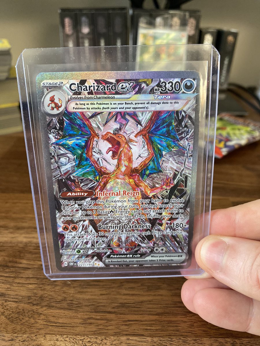 LoneWolfWizard's tweet photo. Yoooo no way. Big Zard bit on the 3rd pack. #PokemonTCG #Charizard #Pokemon #ObsidianFlames https://t.co/fby4RmG108
