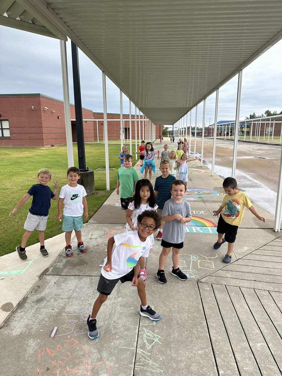 TweetDCS_LPS's tweet photo. The wet ground didn’t stop first graders from stretching their legs on the new sensory walk. We are grateful for our @LPS_PTO for providing this exciting activity. Thank you to Mrs. Nicole and Mrs. Sandy for painting our fabulous new walk. #beyondtalented #TeamDCS #LPSRocks https://t.co/N4u03c1WS2