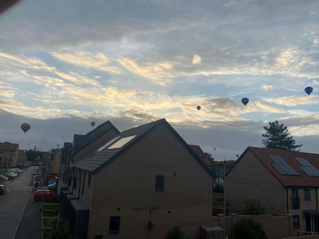 Sometimes Bristol is the best place in the world.  Balloons in the sky and people in the streets. Beautiful.