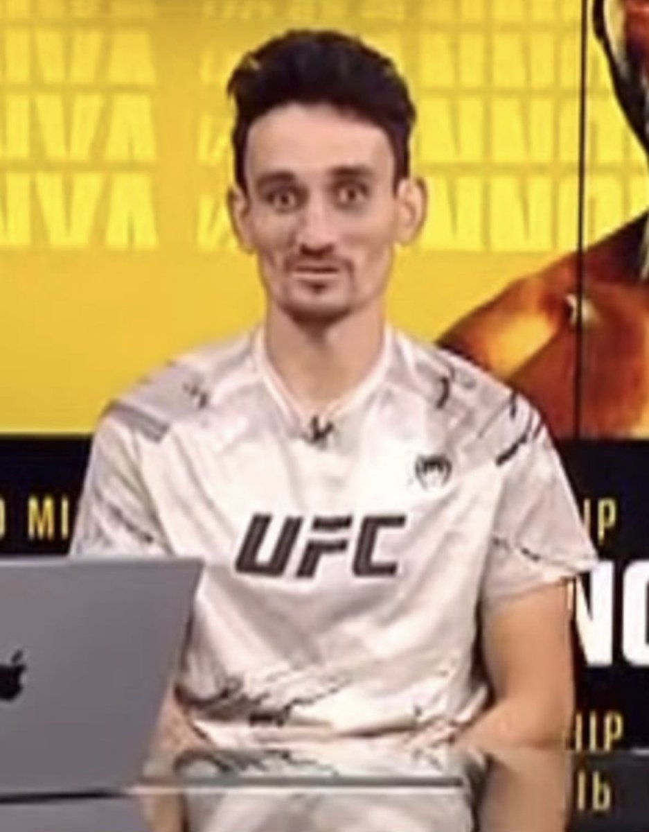 BenTheBaneDavis's tweet photo. Max Holloway looking zoinked on the desk https://t.co/v1pbGnTdc6