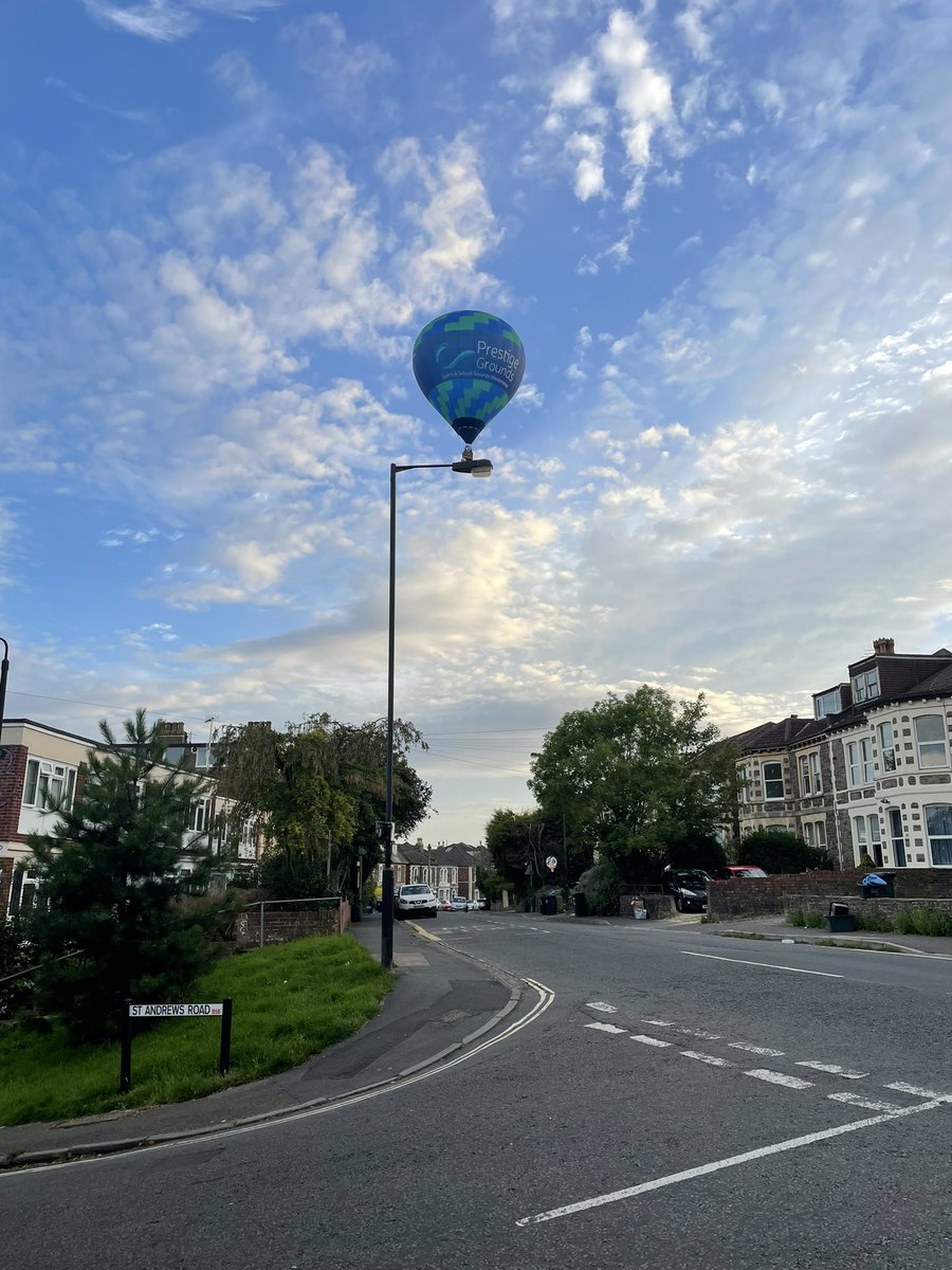 #BristolBalloonFiesta balancing on lamppost at top or St Andrews