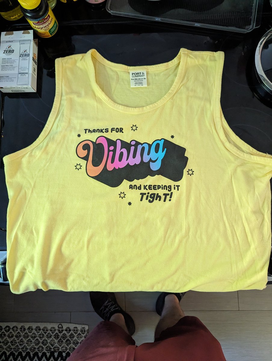 If the new <a href="/McElroyFamily/">The McElroy Family</a> merch Vibing tank wasn't made by a completely different manufacturer, I'd almost swear they just chopped the sleeves off of existing inventory and threw an exposed binding hem on it.

Very different cut from what was shown in the photos.