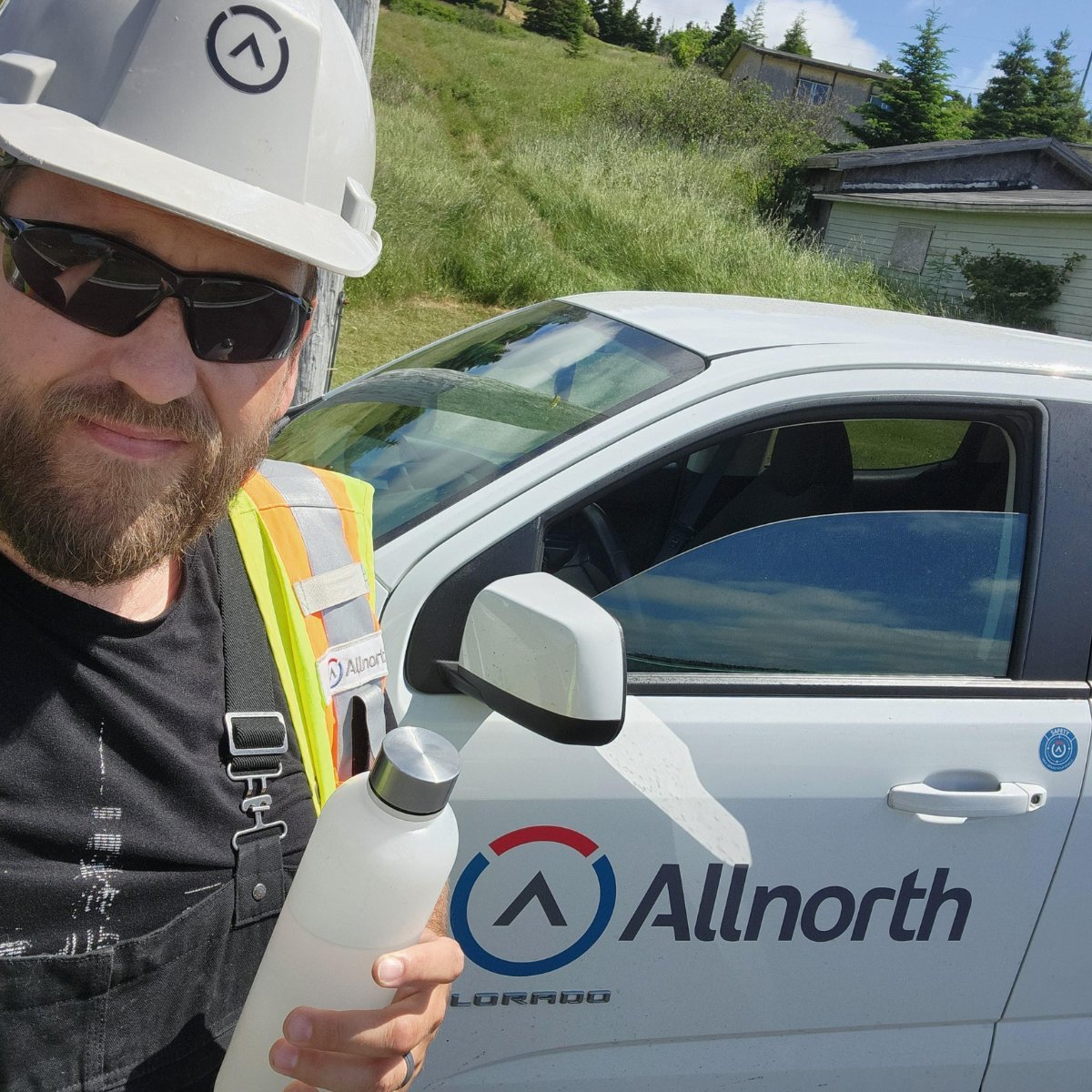Allnorth's tweet photo. With the humidity, it’s a balmy high 30s day in Newfoundland &amp; Labrador but the compaction testing must go on as planned! Chris is remembering to stay hydrated by drinking plenty of water and reminds us all to do the same! #safetyineverythingwedo https://t.co/ONHIa7Yhen