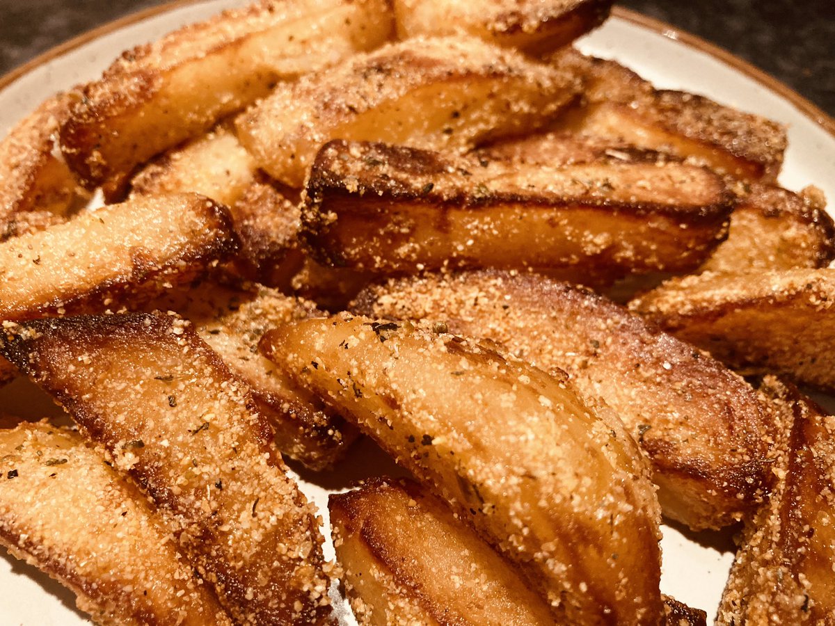 Fancied chips. Made chips. 

Maris pipers with polenta and oregano. Bloody lovely.