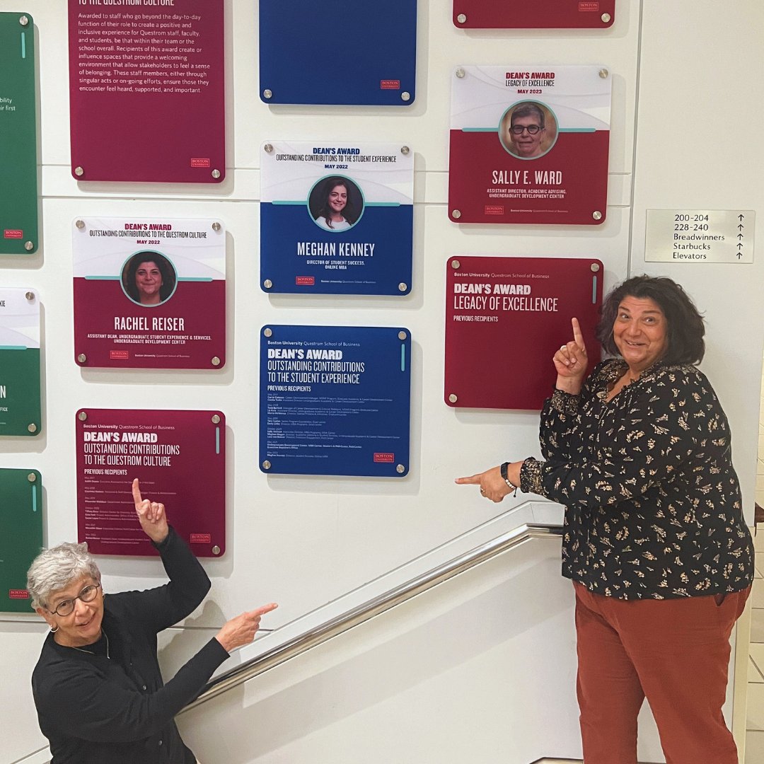 BUQuestrom's tweet photo. Rachel Reiser and Sally Ward ham it up next to their Dean's Awards! Go check out the Dean's Awards Panels in the stairwell leading to the second floor! #QuestromUDC #BUStudentExperience #Questrom https://t.co/xPRtFegx3G