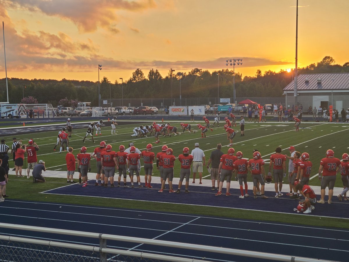 DrAaronAllen1's tweet photo. @wlincolnhs football taking on @NorthGastonHigh in the 3rd game of the @FCALincoln jamboree. Great sunset backdrop for the Rebels to pull off the W!
#engage 
@NC_LCS https://t.co/gq2hIfeo8S