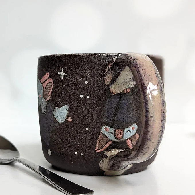 Nanannanananana BATMUG ! with a pink glaze. Which reminds me that I still have to see Barbie !