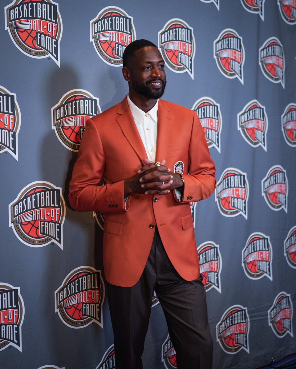 MiamiHEAT's tweet photo. Orange jacket fits just right 👌 #WadeHOF https://t.co/1re8h0H0rm