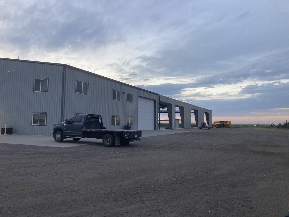 Exciting times watching this go up. Looking forward to getting everything back inside and out of the weather, hats off to the construction crew… hot days to be putting up tin