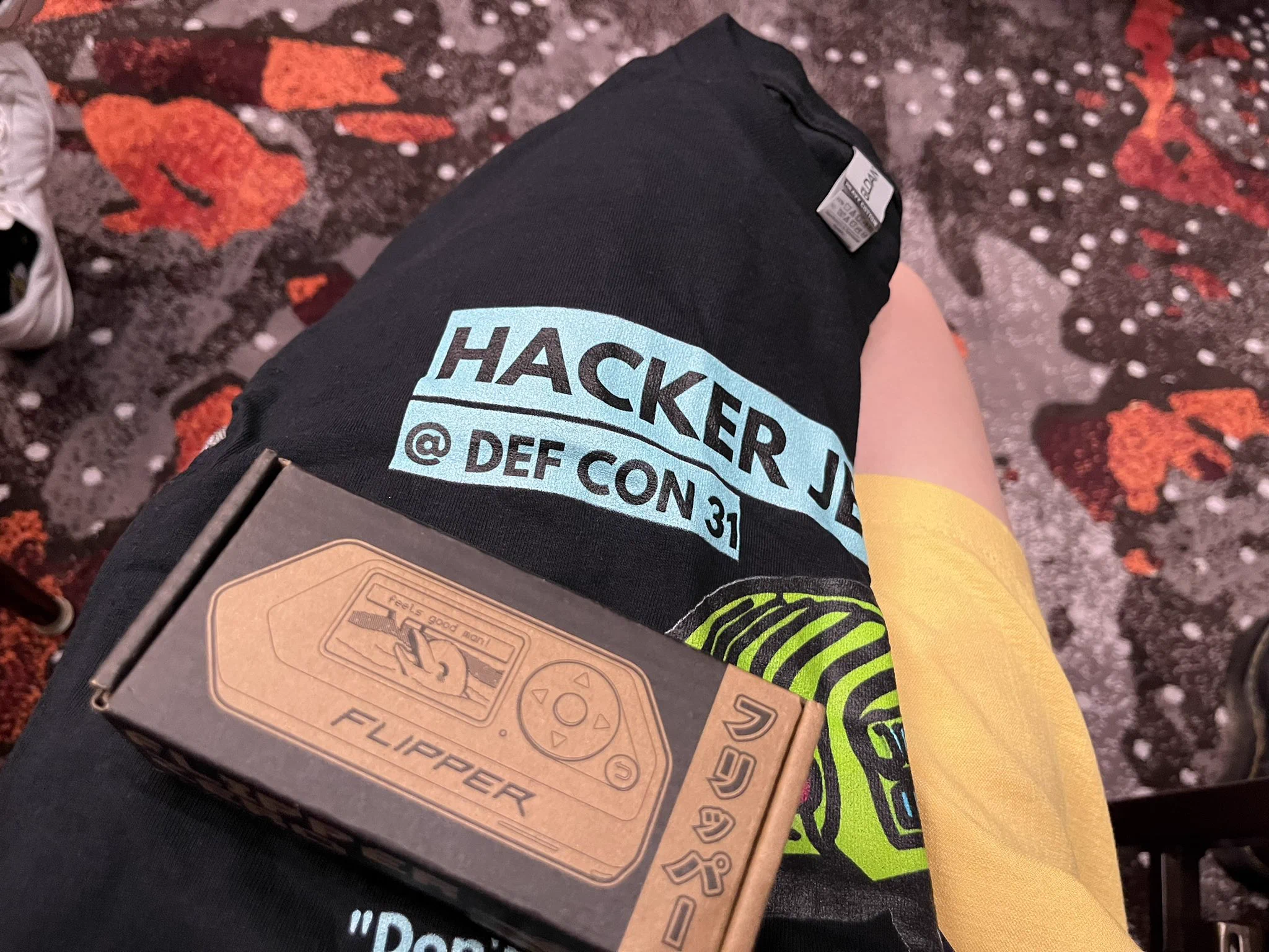 Emily won a Hacker Jeopardy T-shirt and Flipper Zero!