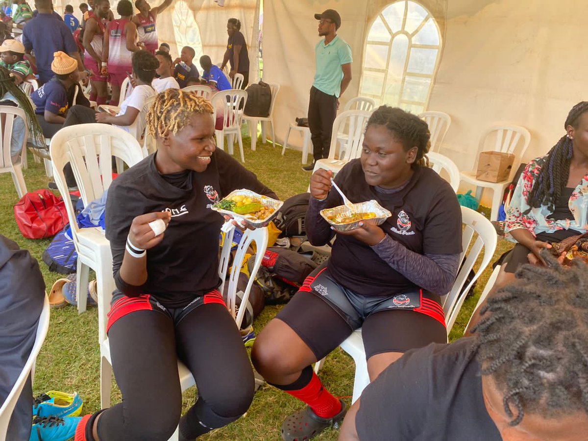 BlackPearlsRFC's tweet photo. After a tough morning match at the #Kyadondo7s, we fuelled courtesy of our food sponsor @GloFoodsUg2. ☺️

Those smiles. 😊 The food is on point! 🤤

#BlackPearlsStrong 🖤❤️
#LONEAfrica
#GloFoodsUg
#NileSpecial7s https://t.co/g51j5wkELb